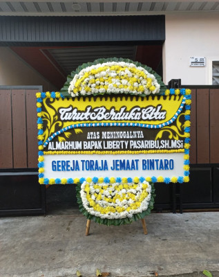 Papan Bunga Duka di 24 Ilir